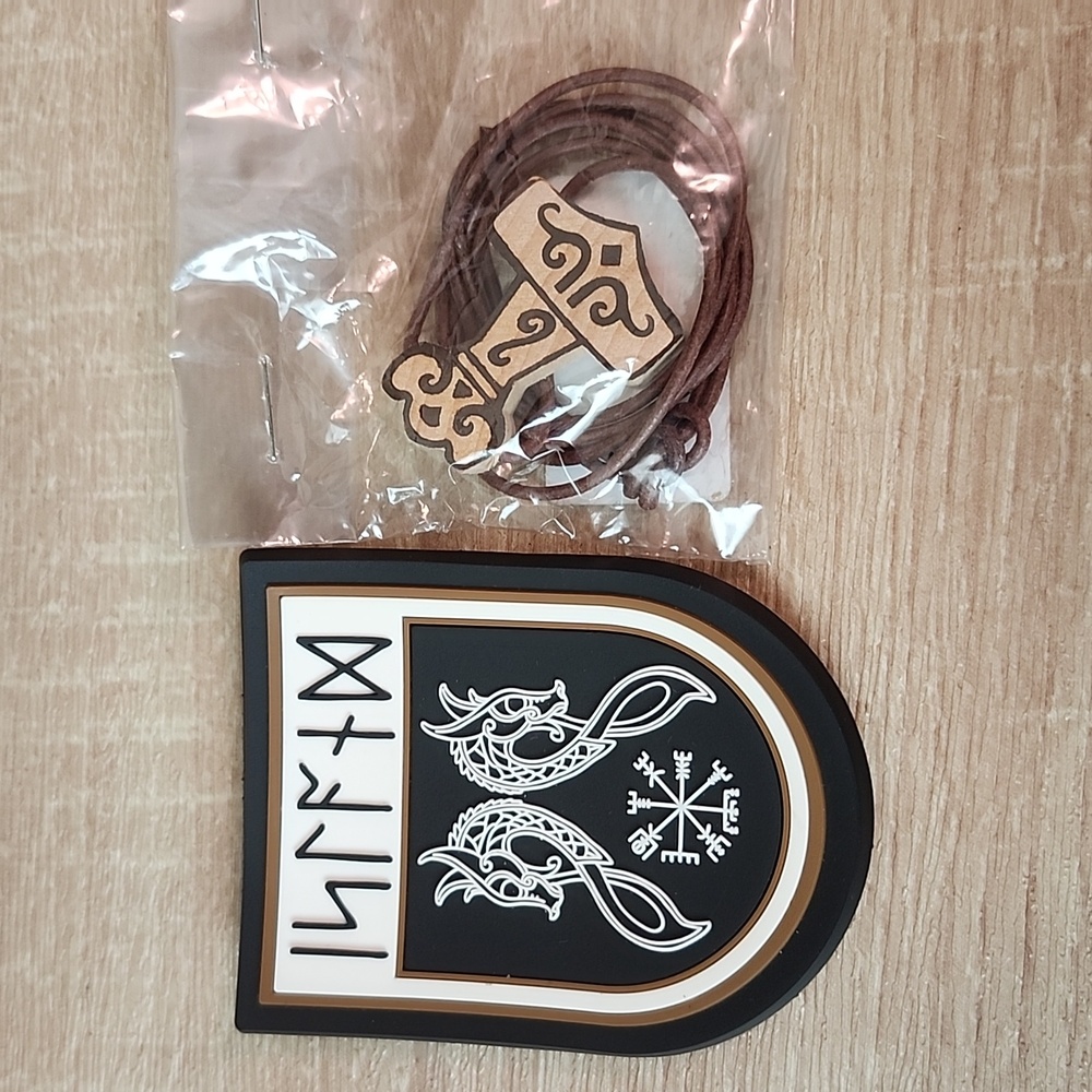 Iceland dragon head magnet and Thor's hammer necklace